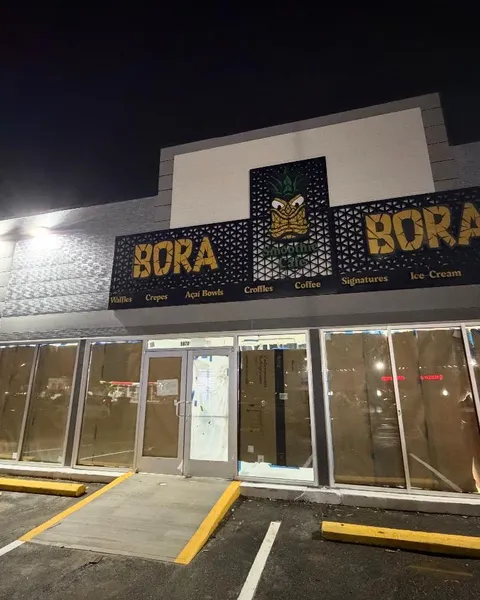 Storefront glass line secured with overnight board-up