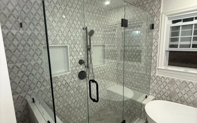 Frameless glass shower door installation